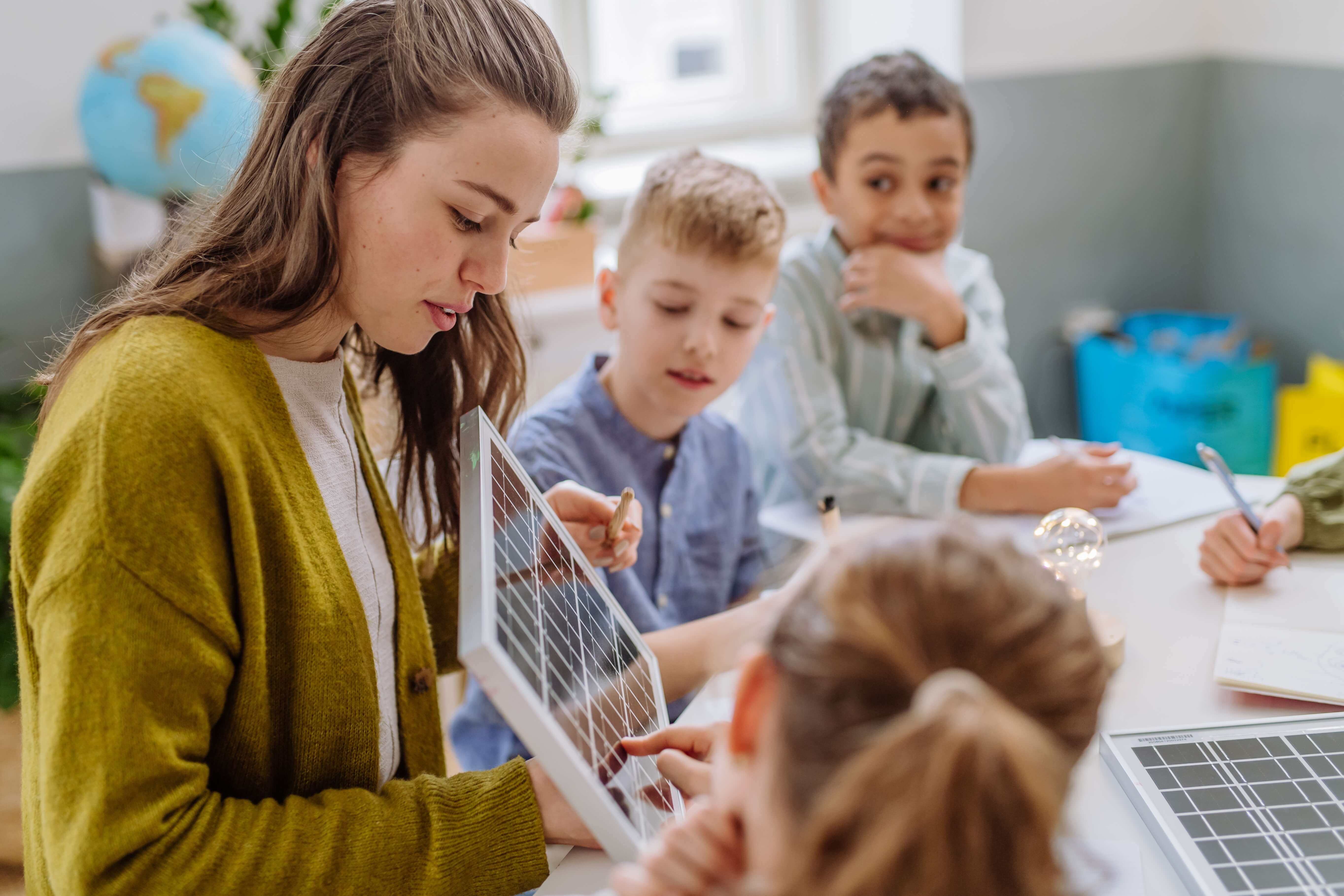 female ECT demonstrating an activity for students